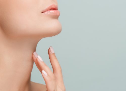 Woman's sculpted chin after Kybella treatments
